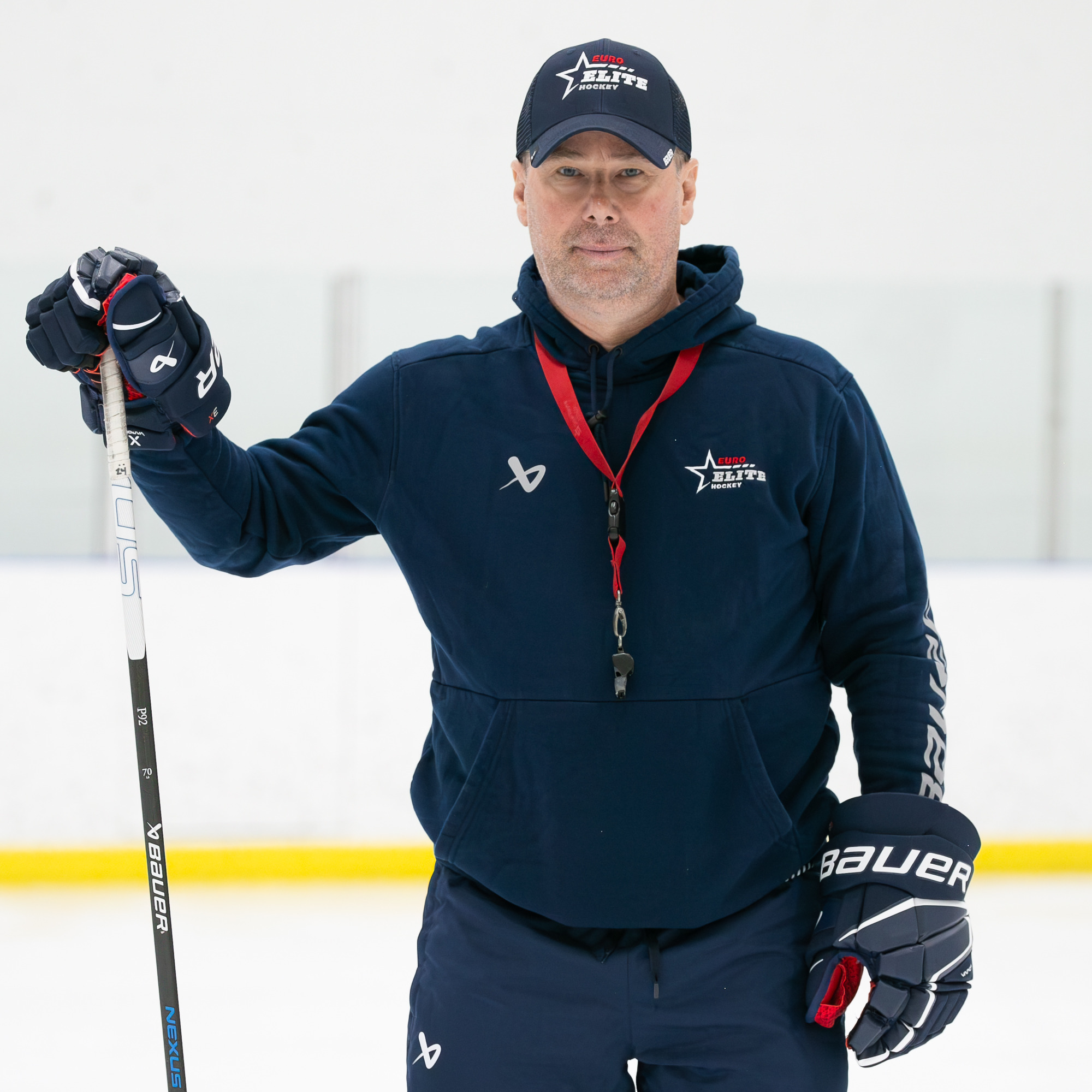 Coach Guido Lamberti-Charles on the ice in Euro Elite Hockey coaching apparel