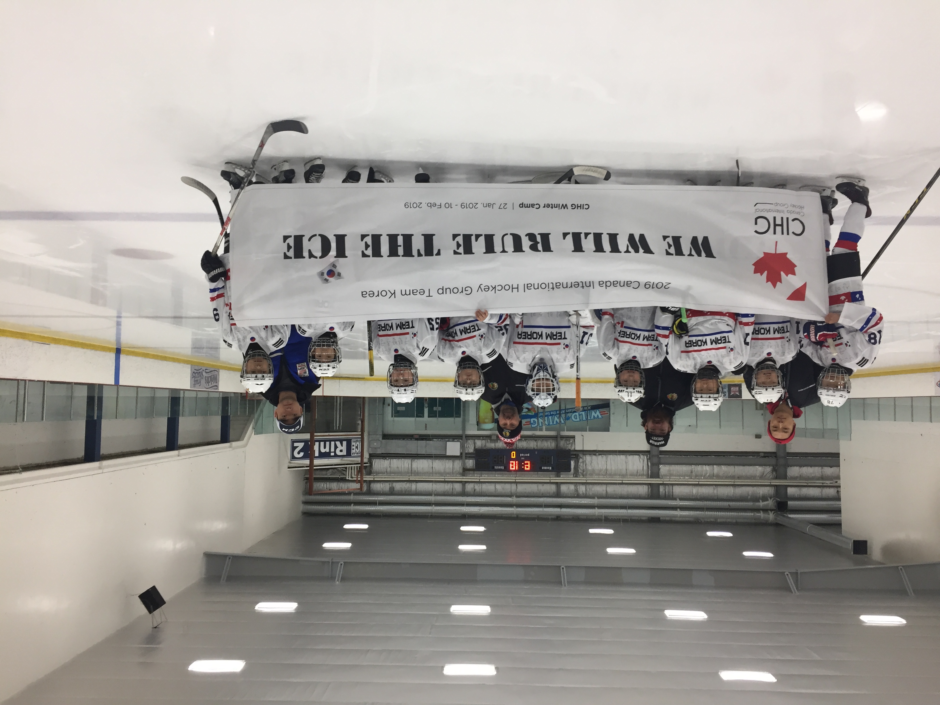 Minor hockey players and coaches together at a training camp