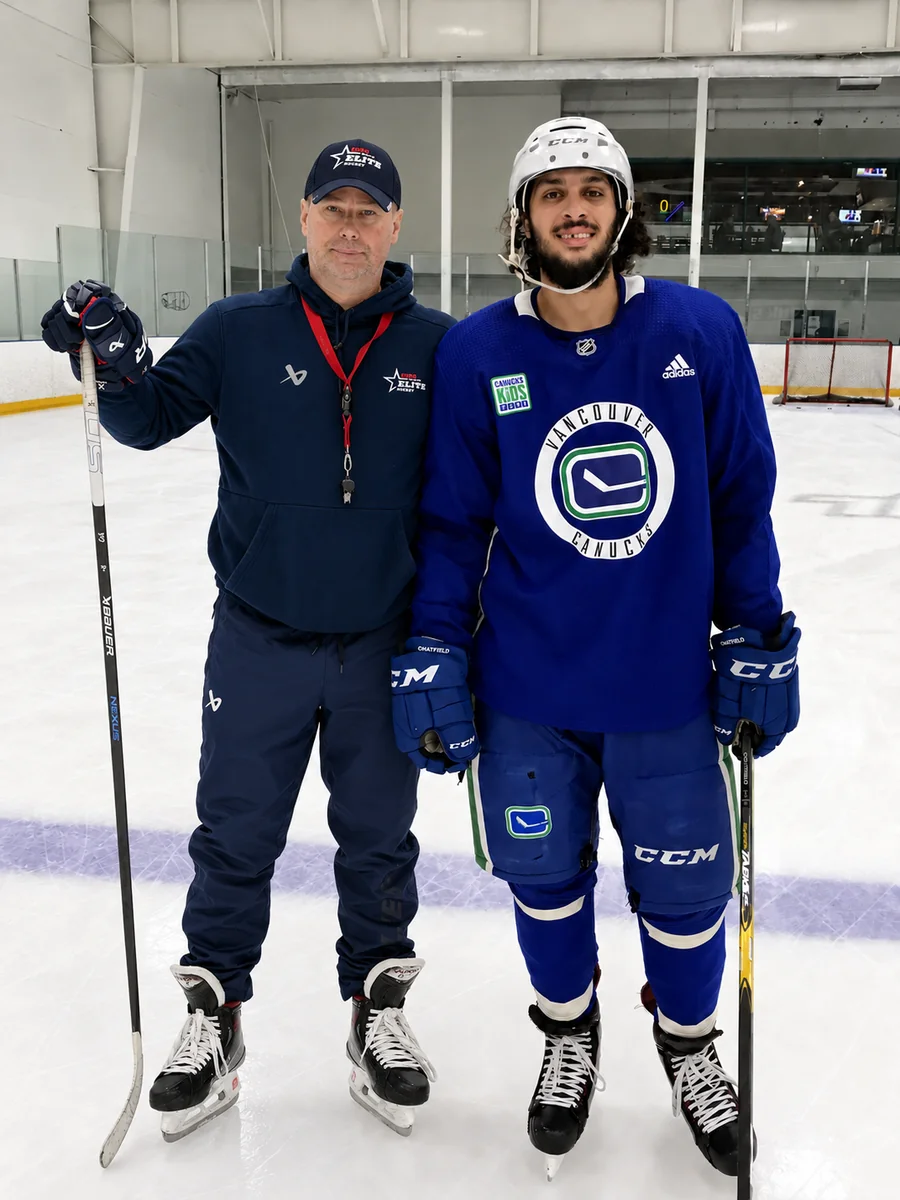 Guido Lamberti-Charles with Jalen Chatfield on the ice