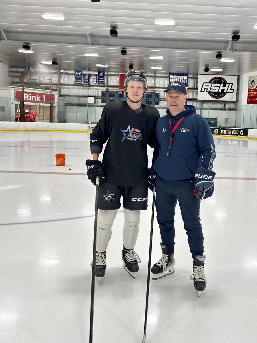 Guido Lamberti-Charles with Jaxon Fuder on the ice